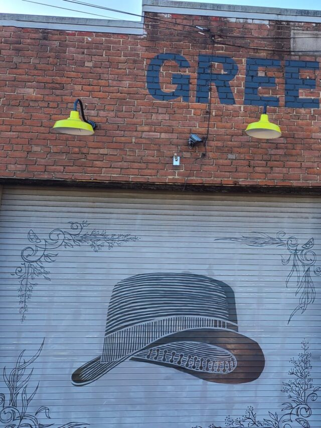 cropped-Green-Hat-Building-scaled-1.jpg